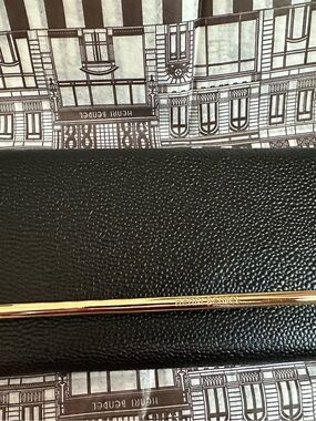 henri bendel black pebbled leather wallet with gold trim